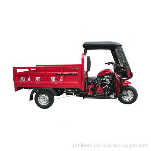 A compact motor tricycle with a driver's cab